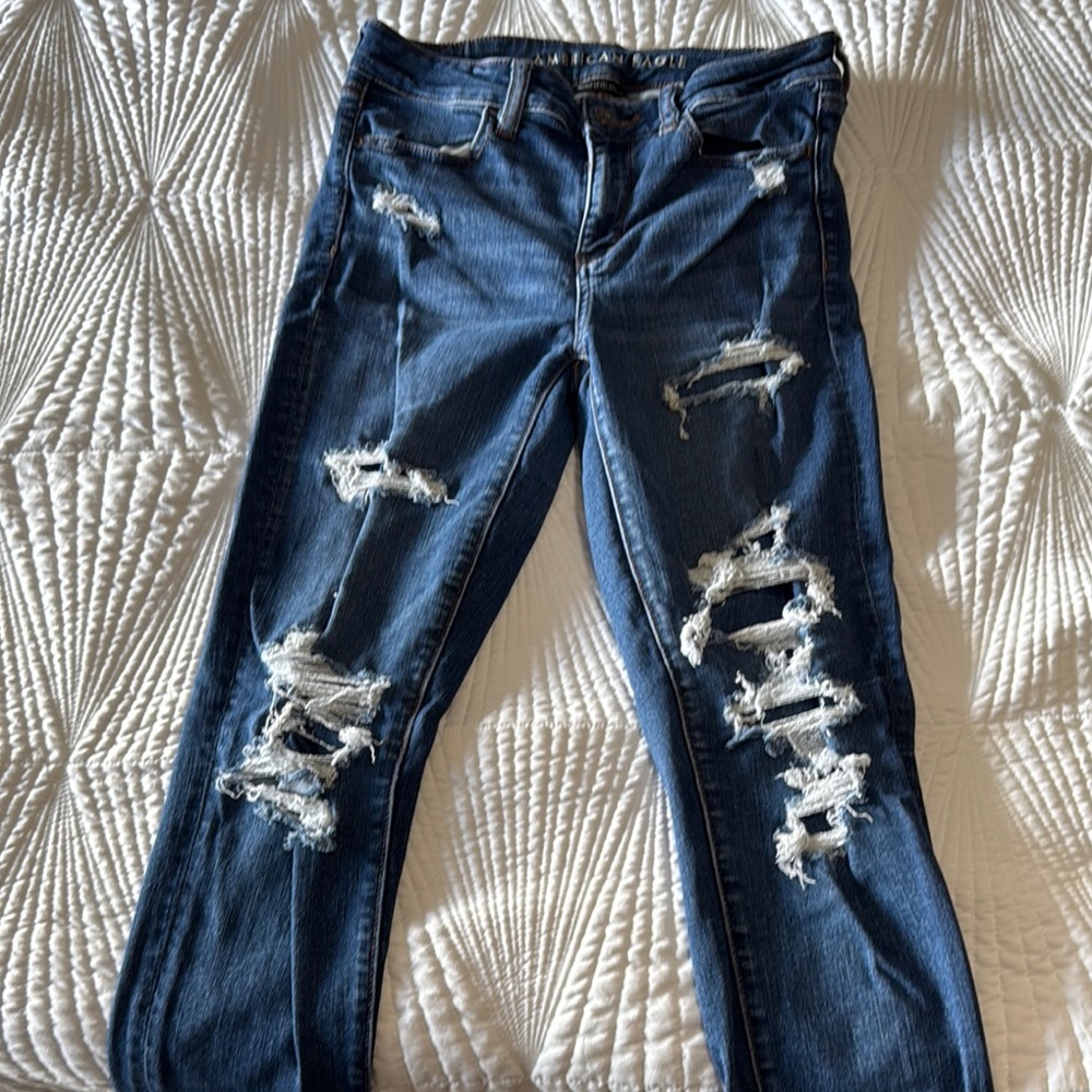 Distressed Blue Jeans hi rise American Eagle